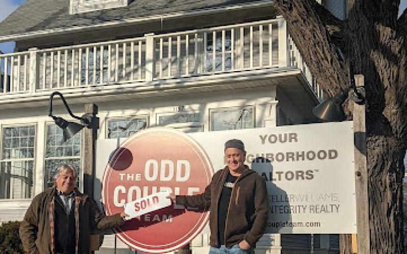 The Odd Couple Team - Coldwell Banker Realty